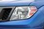 2014 Nissan Frontier SV Extended Cab Pickup Headlamp Detail